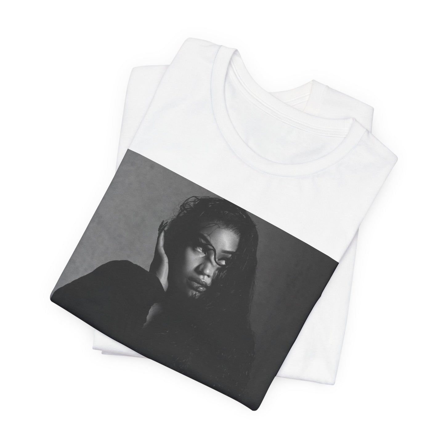 A black graphic t-shirt featuring a black and white graphic or photo of Nicki Minaj as a glamour queen.