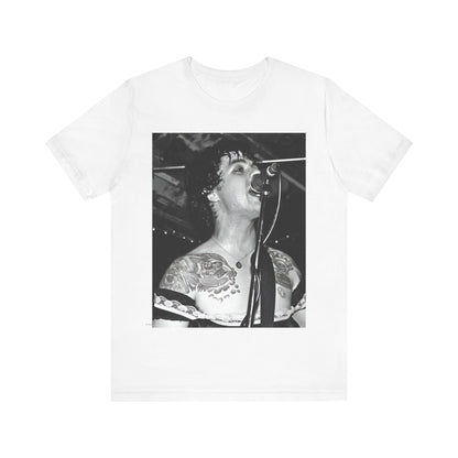 A black graphic t-shirt featuring a black and white graphic or photo of Green Day performing live on stage.
