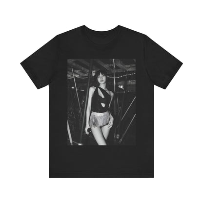 A black graphic t-shirt featuring a black and white graphic or photo of Lisa in a backstage setting.