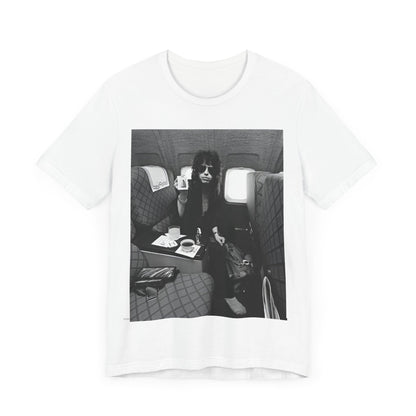 A black graphic t-shirt featuring a vintage 70s-style illustration of an airplane with Aerosmith branding, representing their tour plane from that era.
