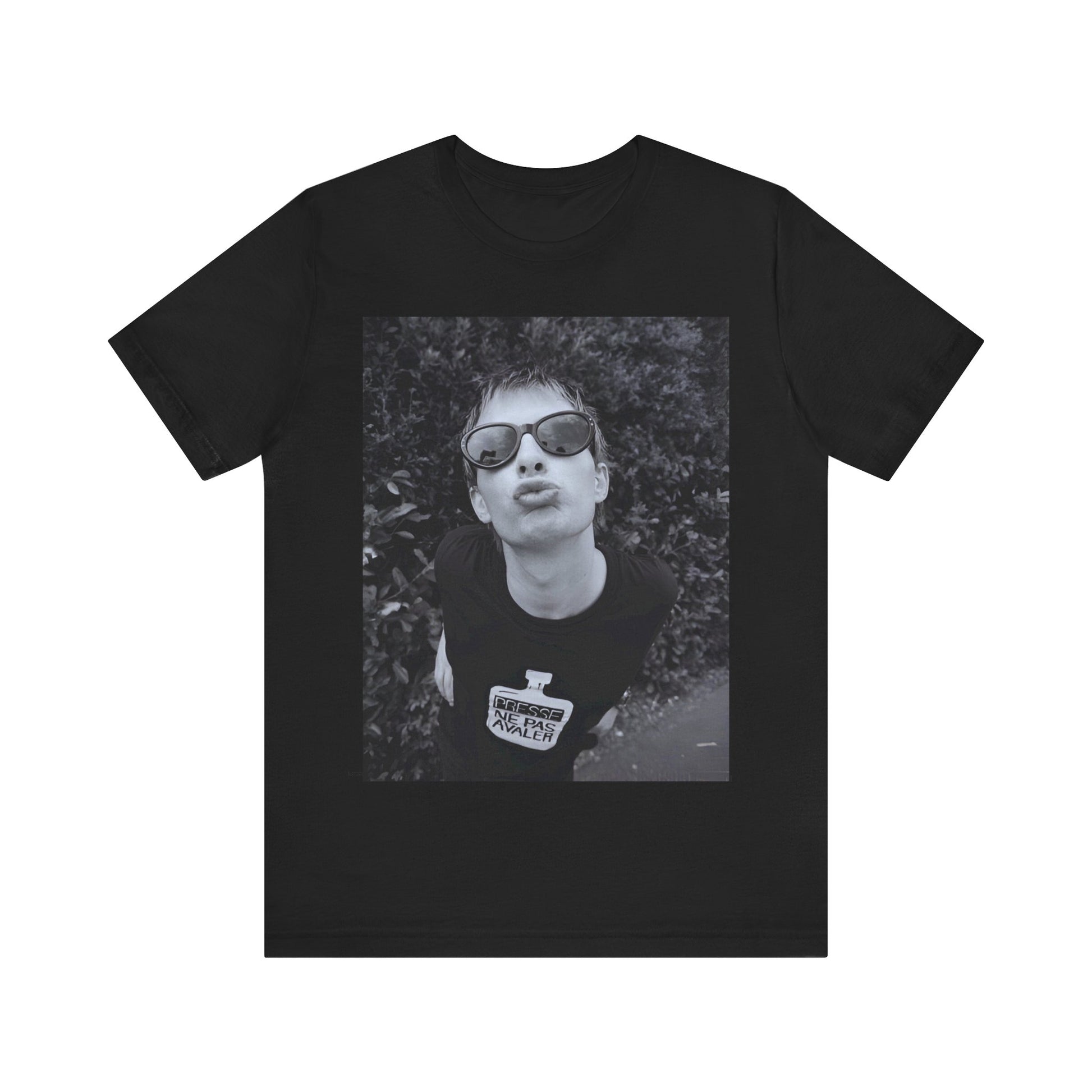 A black graphic t-shirt featuring a retro 90s graphic of Thom Yorke from Radiohead.