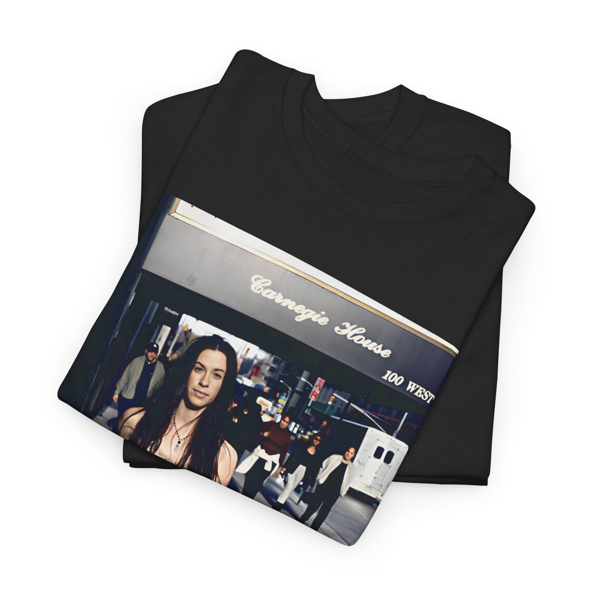 A black graphic t-shirt featuring a 90s-style graphic of Alanis Morissette with New York City elements or skyline in the background.