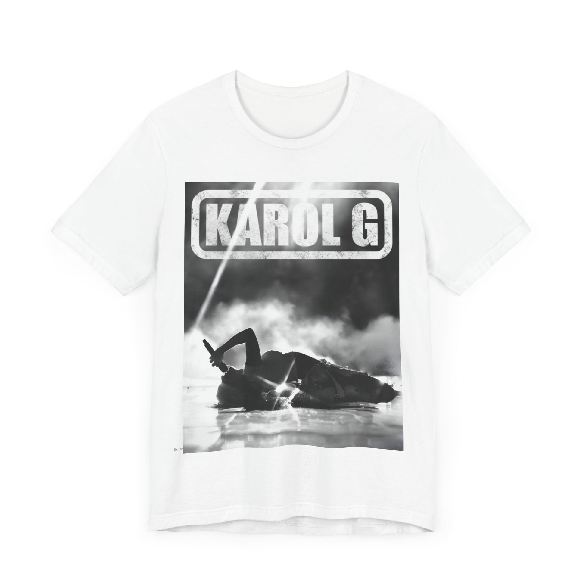 A black graphic t-shirt featuring a black and white graphic or photo of Karol G performing live on stage.