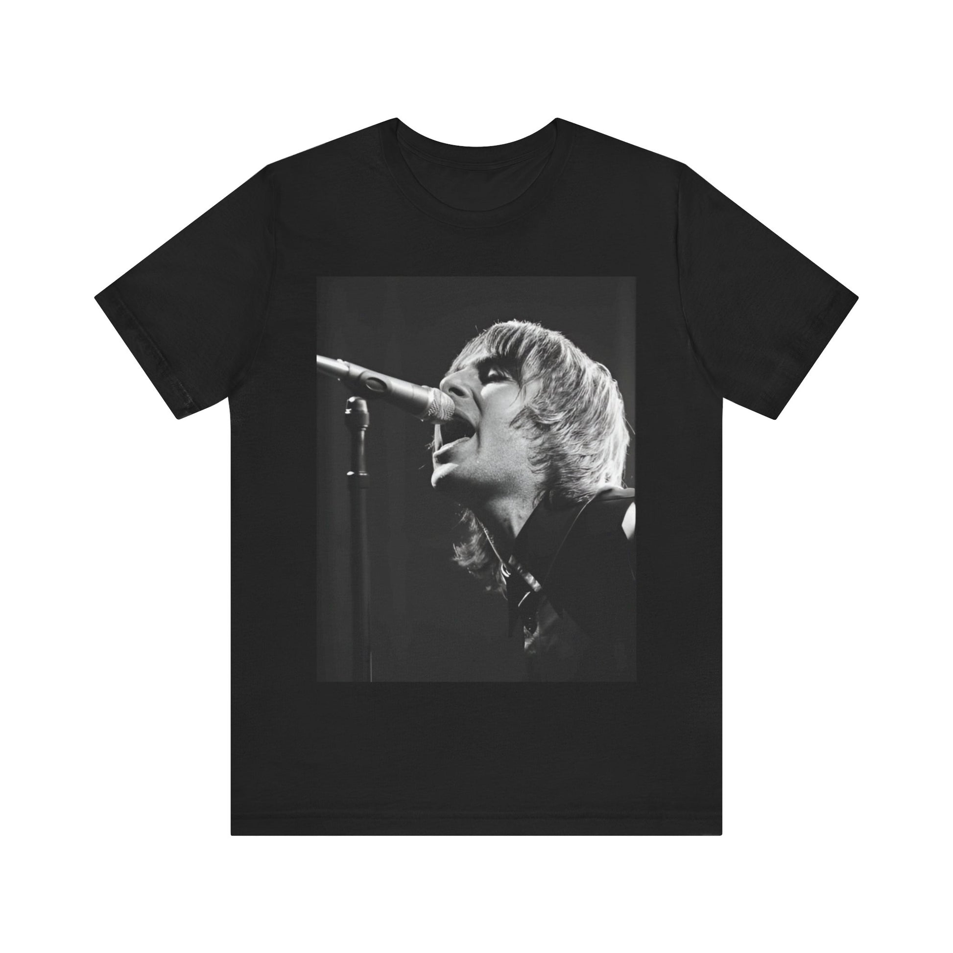 A black graphic t-shirt featuring a black and white graphic or photo of Liam Gallagher from Oasis performing live on stage.