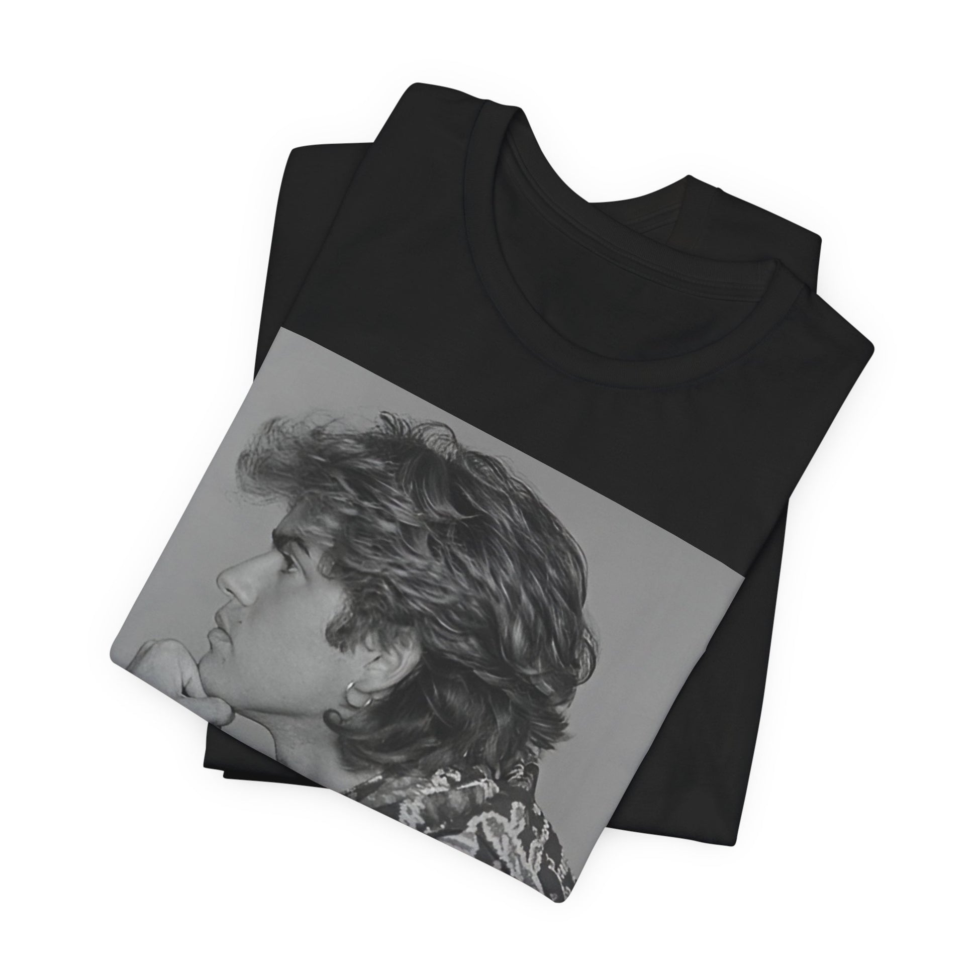 A black graphic t-shirt featuring a graphic of George Michael from his 80s Wham! era.