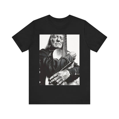 A black graphic t-shirt featuring a vintage country legend graphic of Willie Nelson.