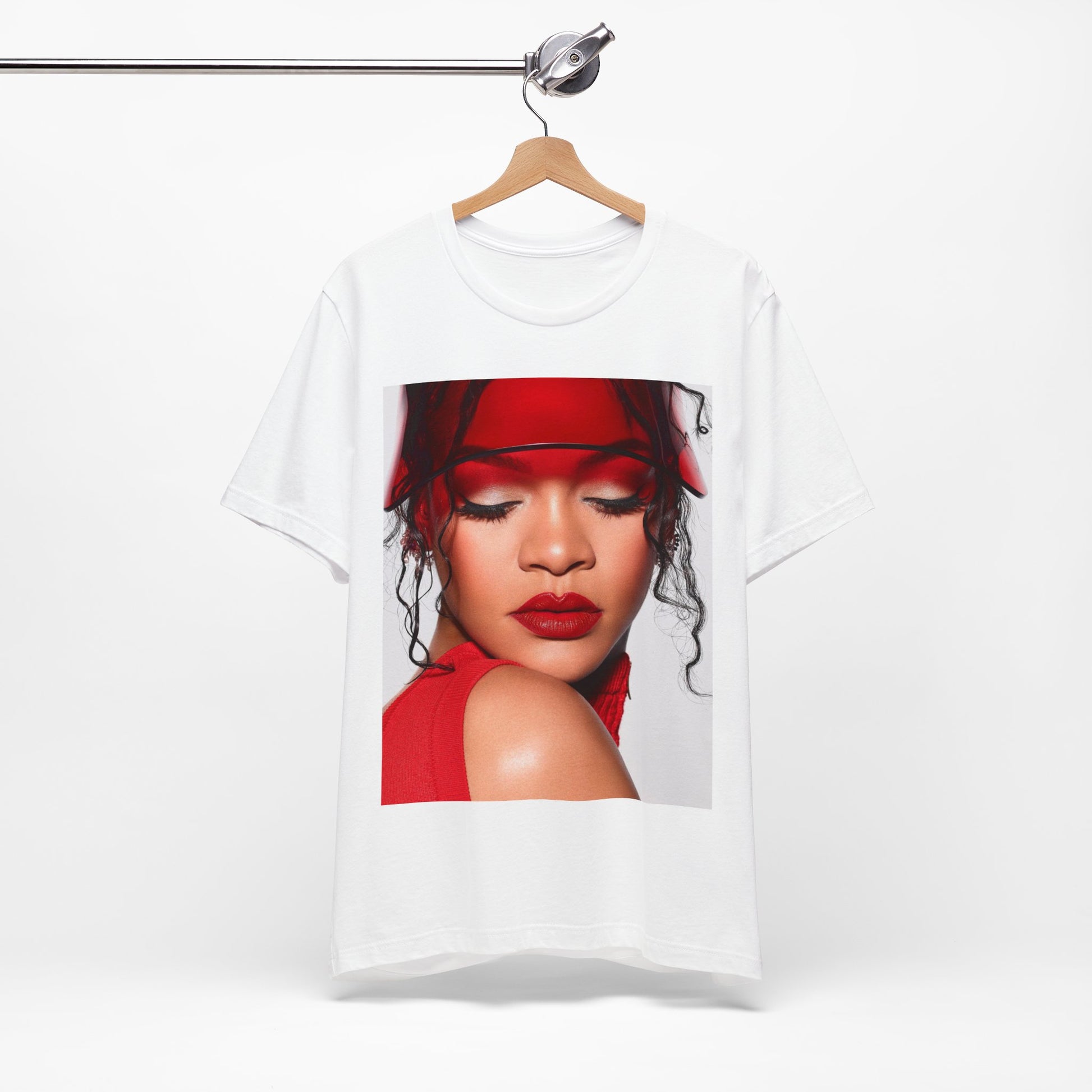A black graphic t-shirt featuring a casual pop fan graphic of Rihanna.