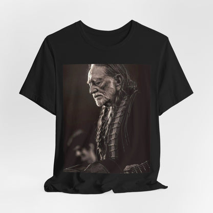 A black graphic t-shirt featuring a vintage country legend graphic of Willie Nelson.
