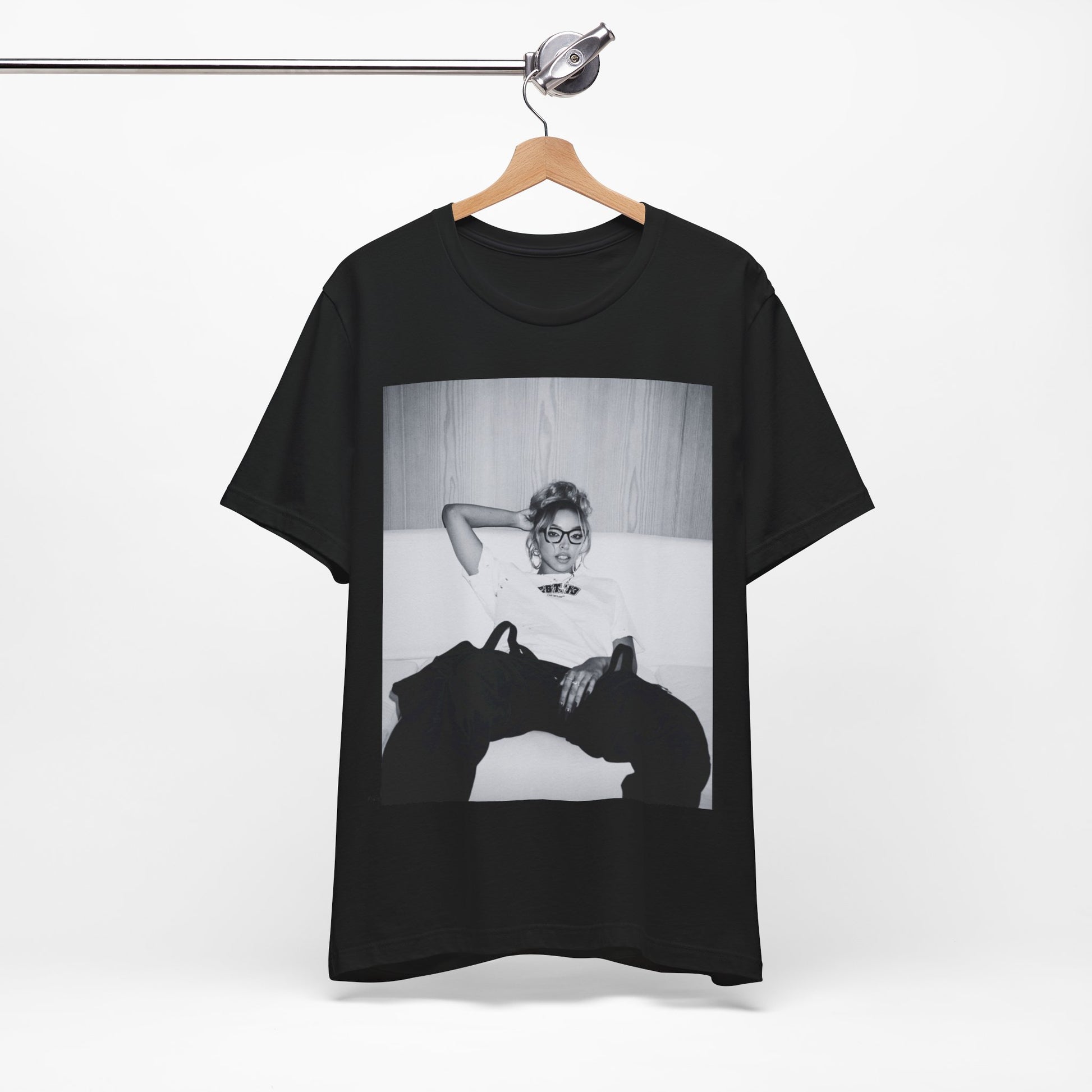 A black graphic t-shirt featuring a black and white portrait photo of Tinashe.