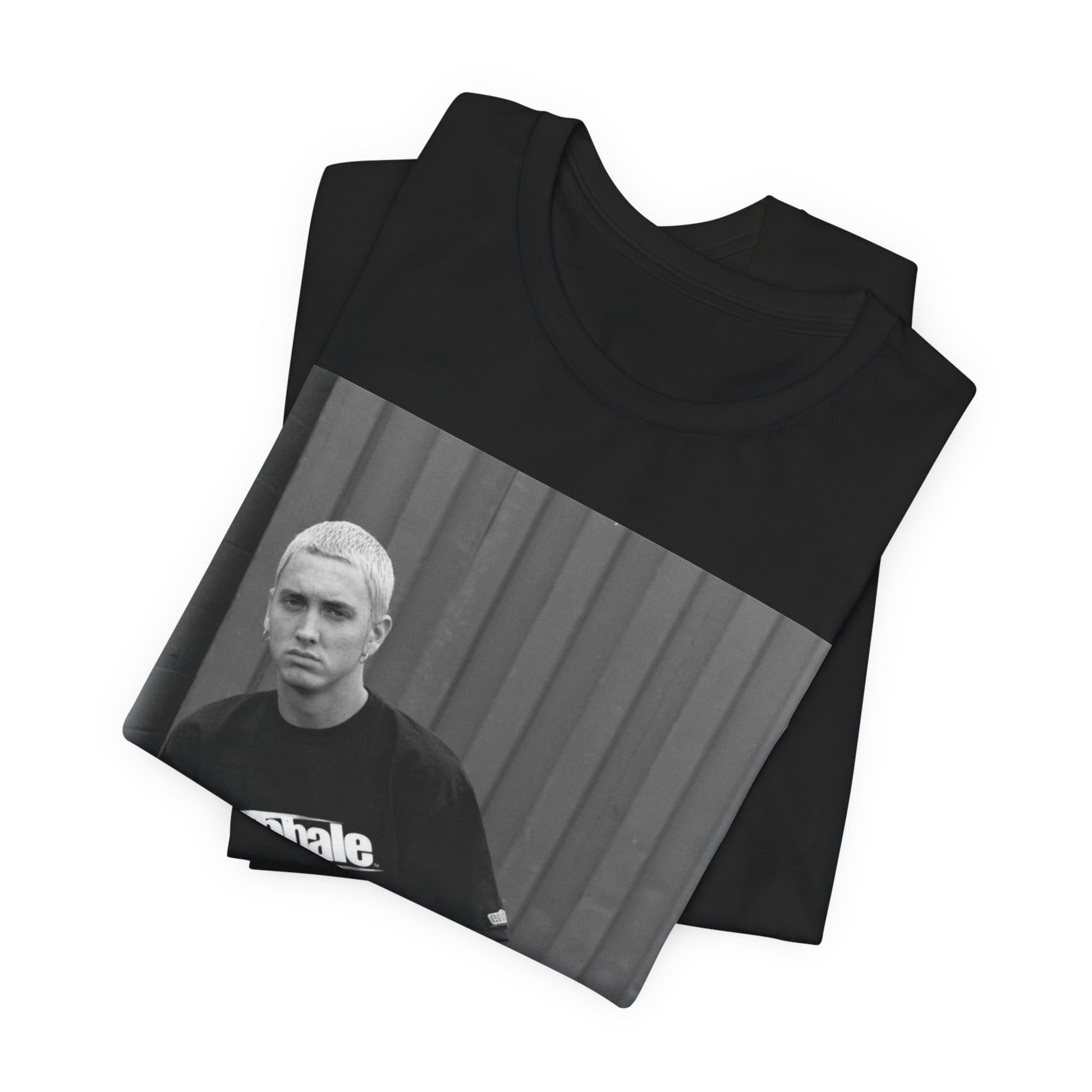 A black graphic t-shirt featuring a graphic of Eminem with a Detroit hip hop aesthetic.