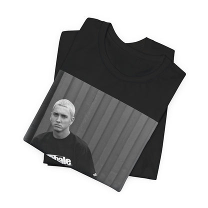 A black graphic t-shirt featuring a graphic of Eminem with a Detroit hip hop aesthetic.
