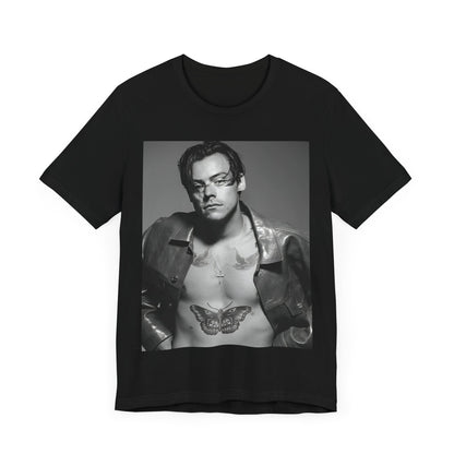 A black graphic t-shirt featuring a black and white portrait photo of Harry Styles.