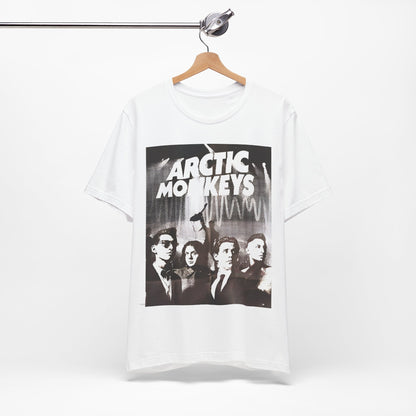 A black graphic t-shirt featuring a retro-style logo for the band Arctic Monkeys.