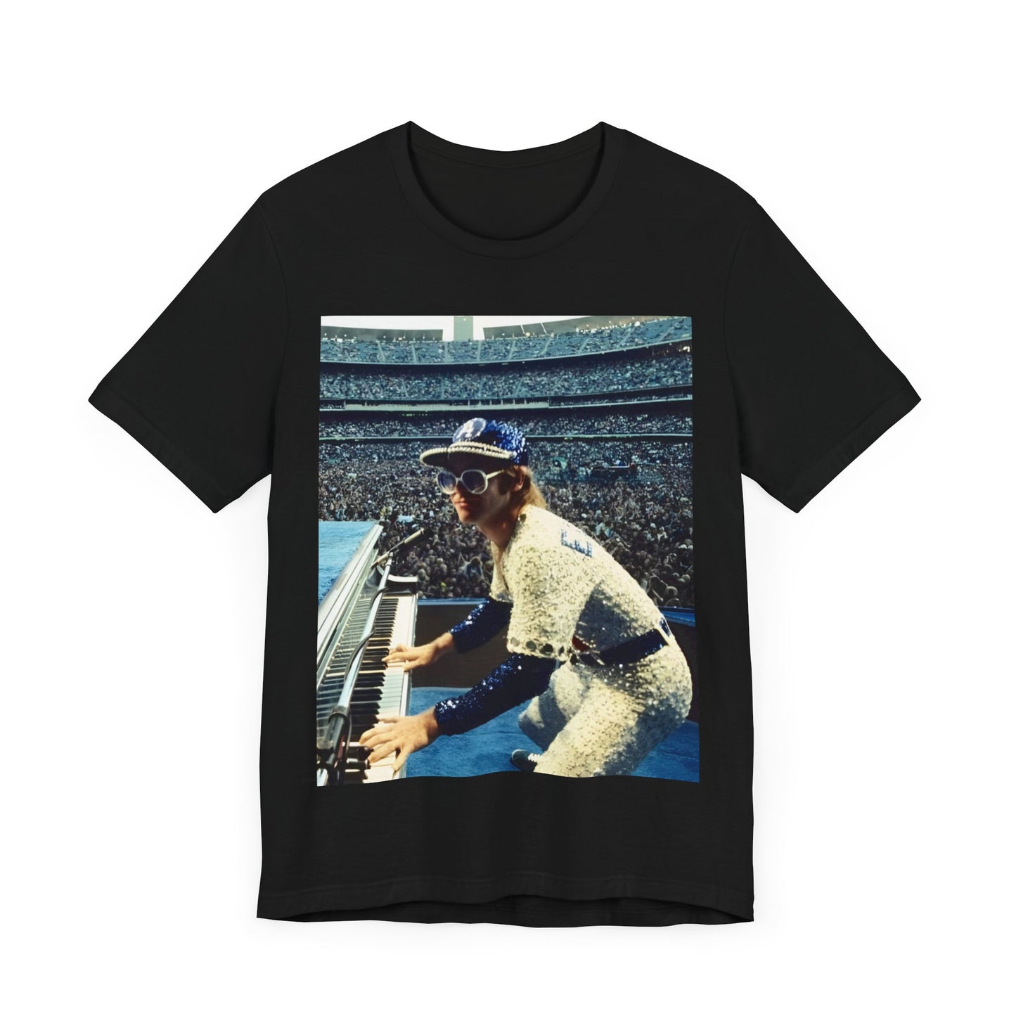 A black graphic t-shirt featuring a photo of Elton John from his 1975 Dodgers Stadium concert.