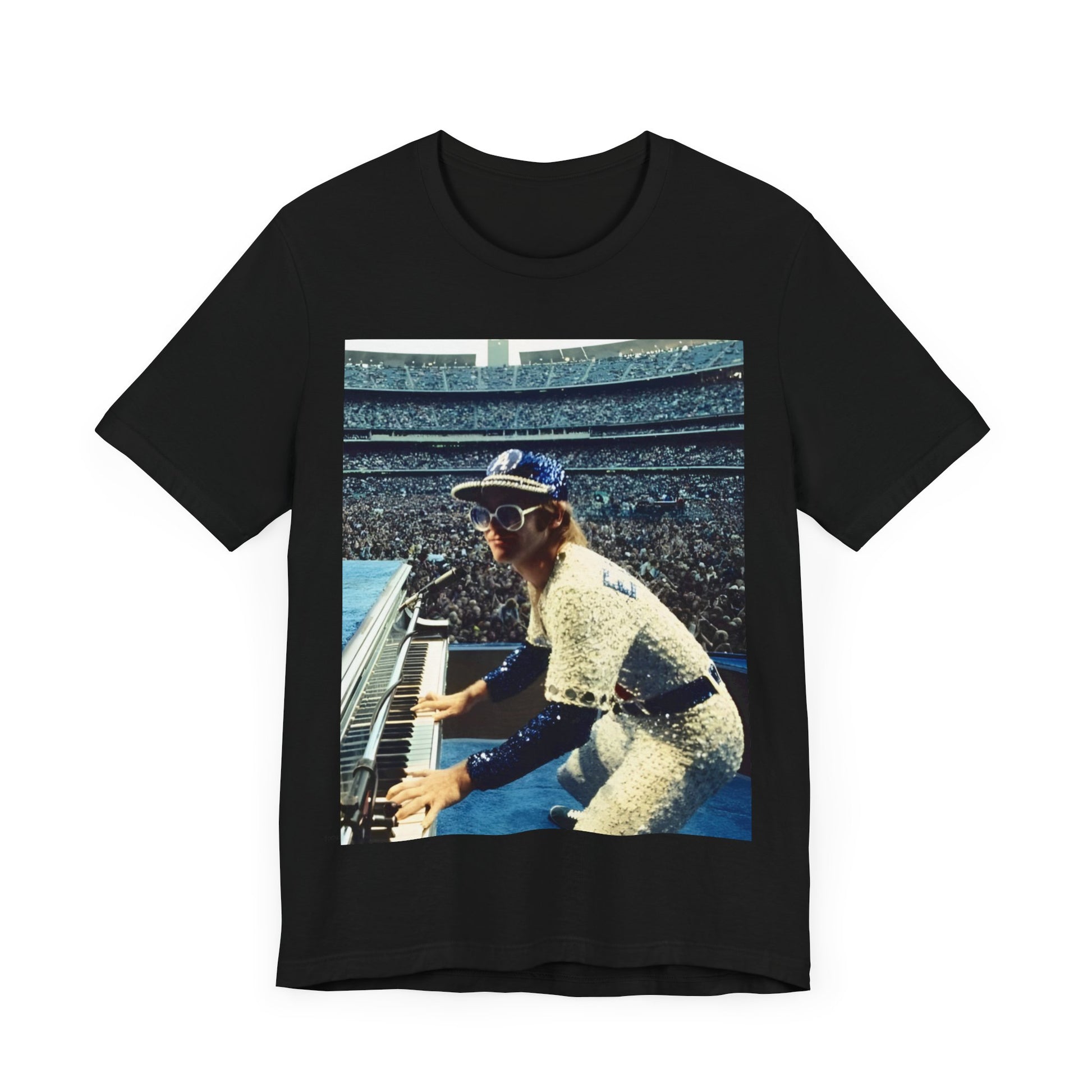 A black graphic t-shirt featuring a photo of Elton John from his 1975 Dodgers Stadium concert.