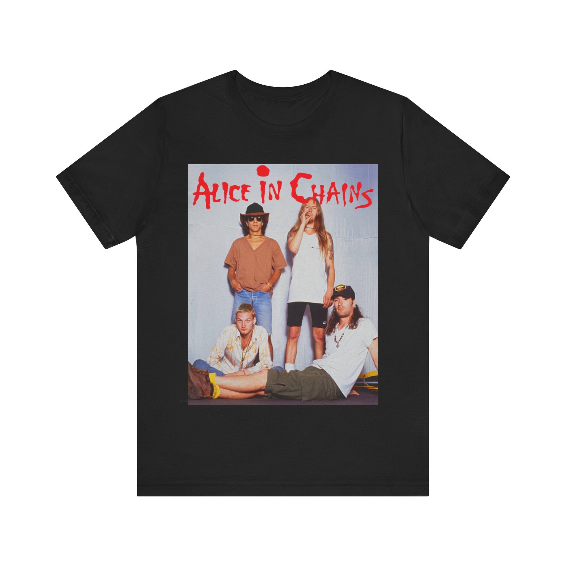 A black graphic t-shirt featuring a band graphic of Alice In Chains from 1990, capturing their early grunge aesthetic.