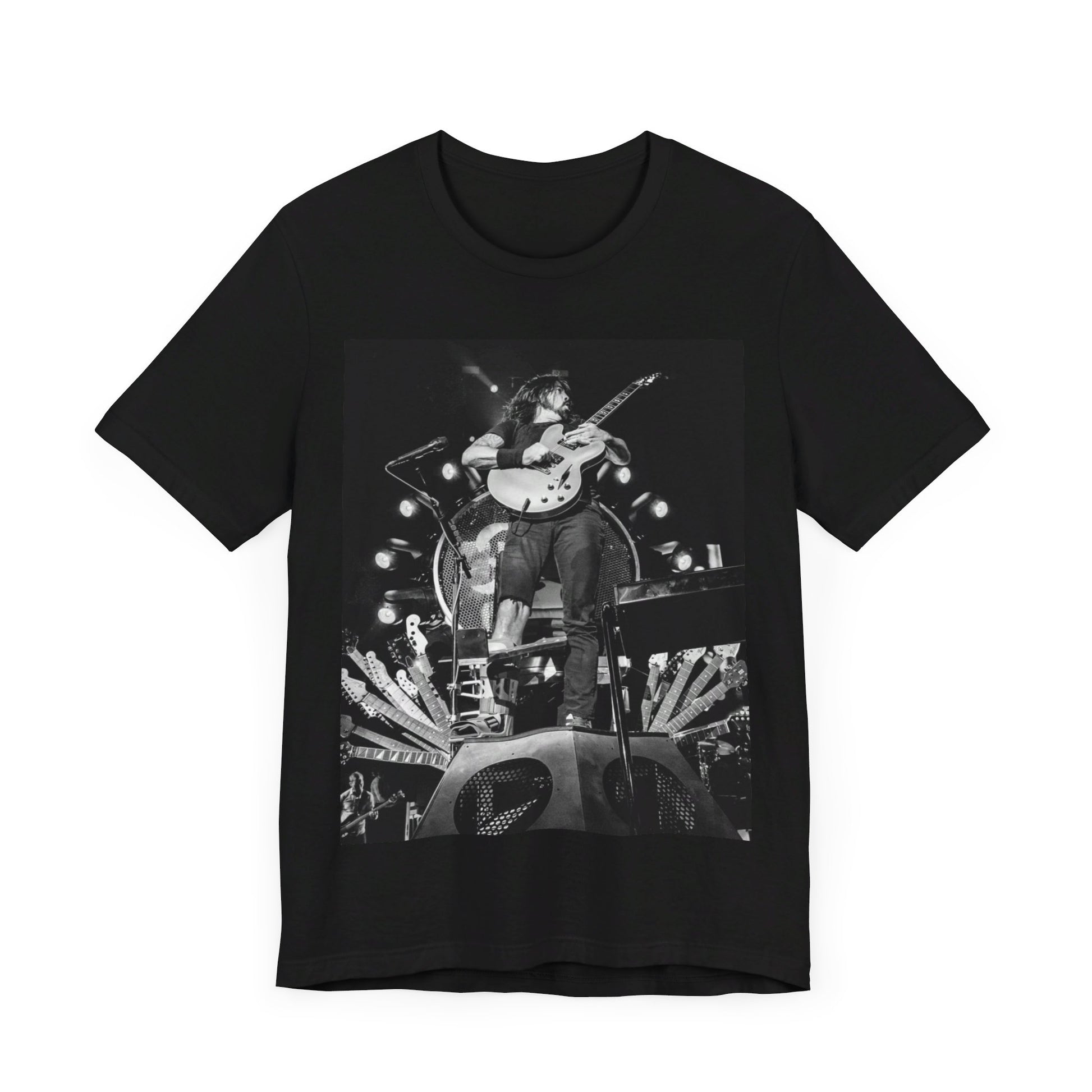 A black graphic t-shirt featuring a vintage photo of Foo Fighters performing live.