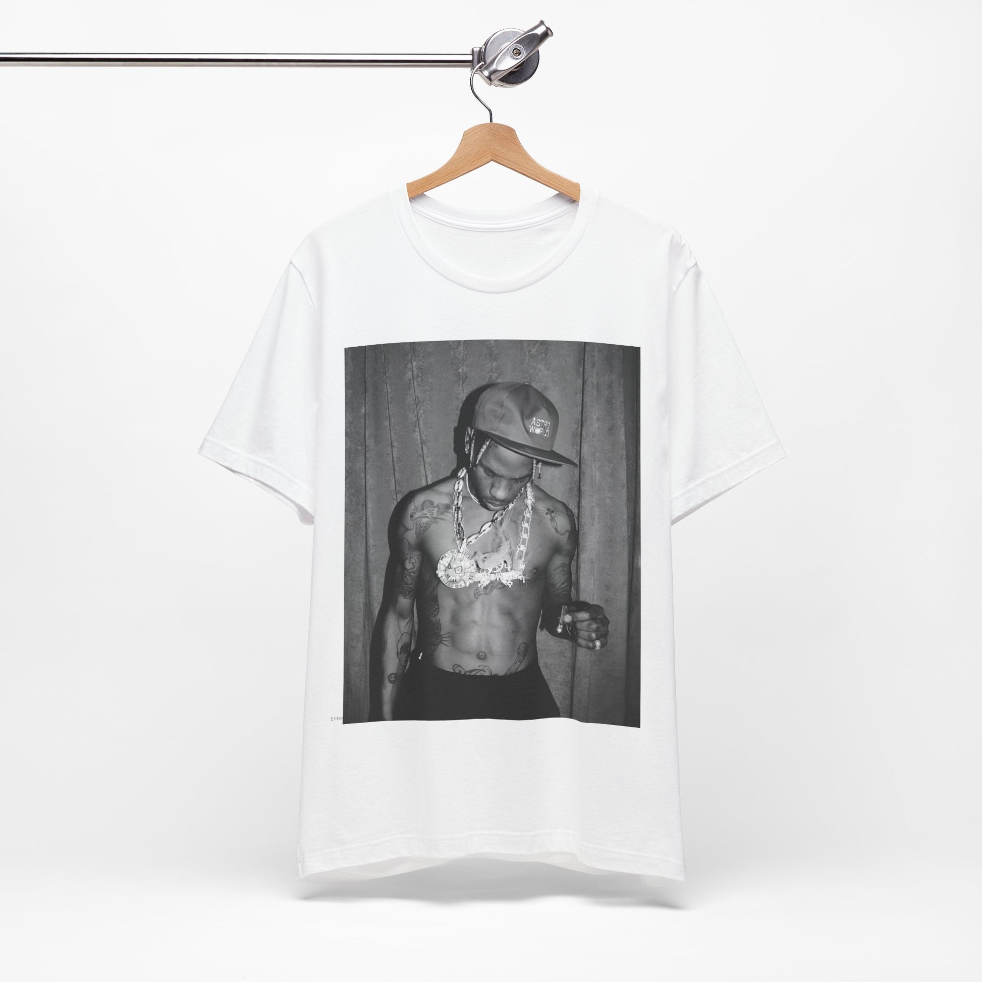 A black graphic t-shirt featuring a graphic of Travis Scott as the Houston rap king.
