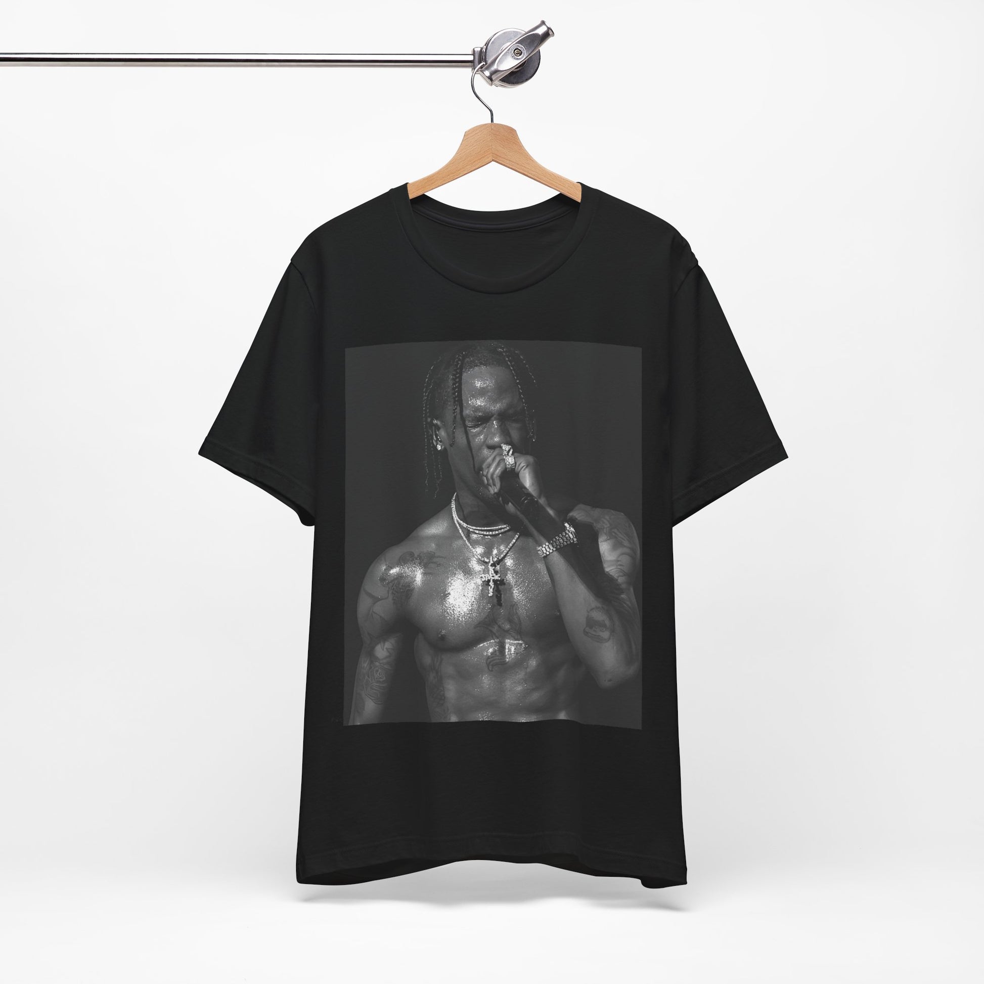 A black graphic t-shirt featuring an underground hip hop graphic of Travis Scott.