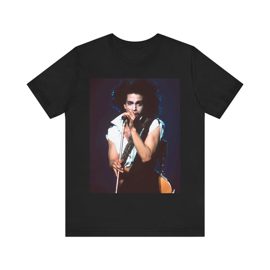 A black graphic t-shirt featuring a 90s live performance graphic of Prince.