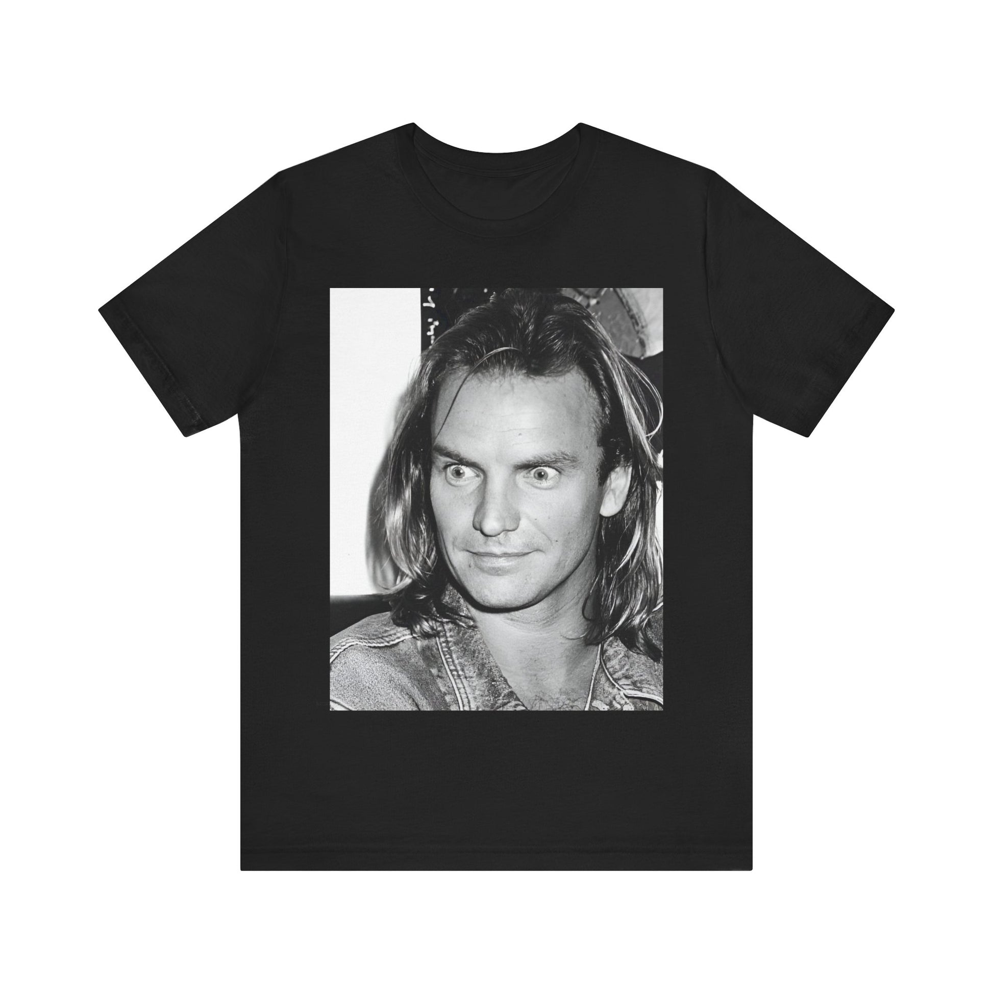 A black graphic t-shirt featuring a retro graphic related to Sting's 'Synchronicity' album era.