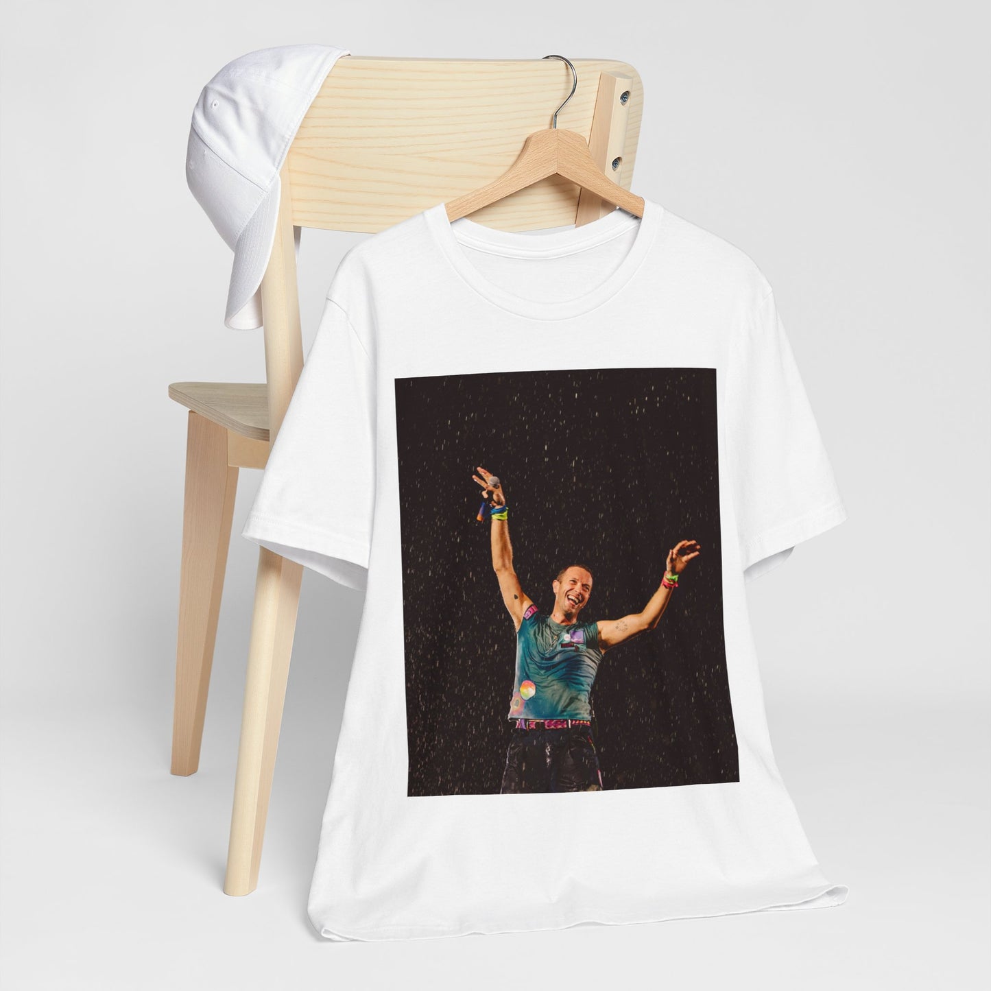 A black graphic t-shirt featuring a graphic related to Coldplay's song 'Fix You'.