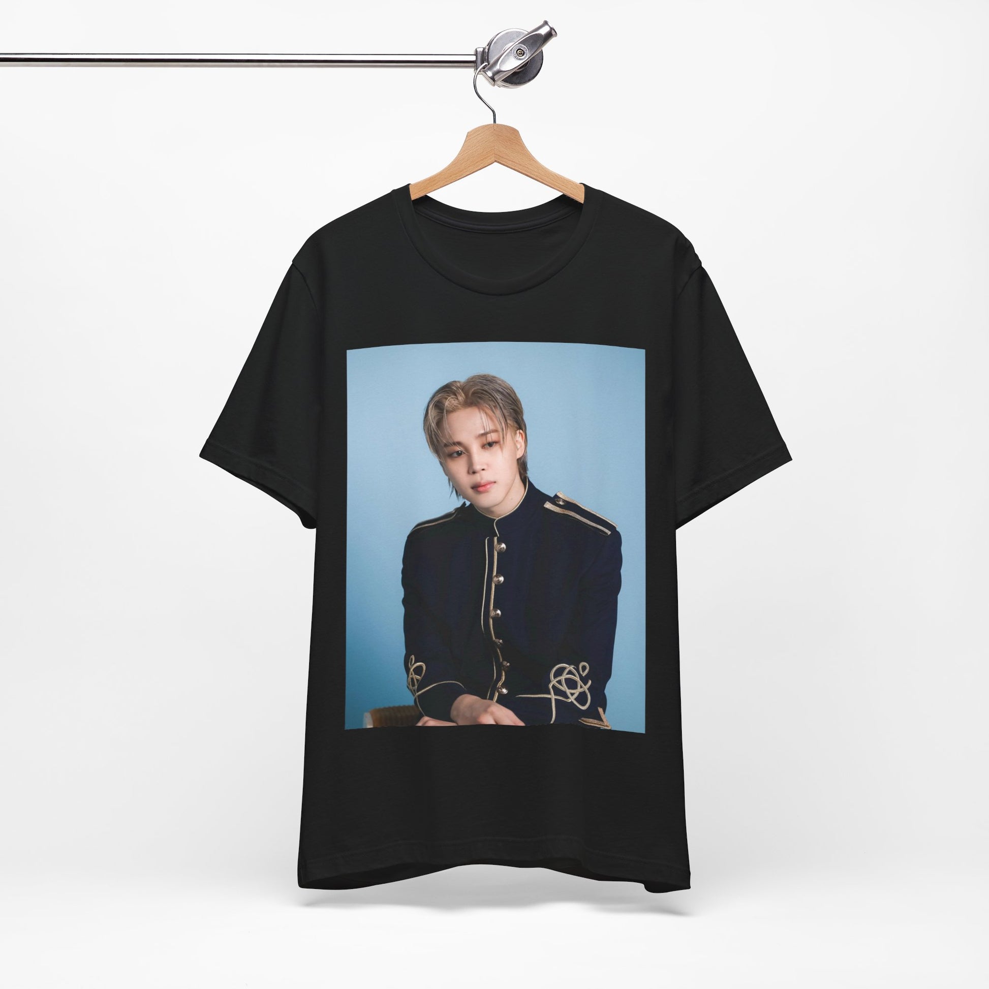 A black graphic t-shirt featuring a graphic related to Jimin's 'FACE' album era.