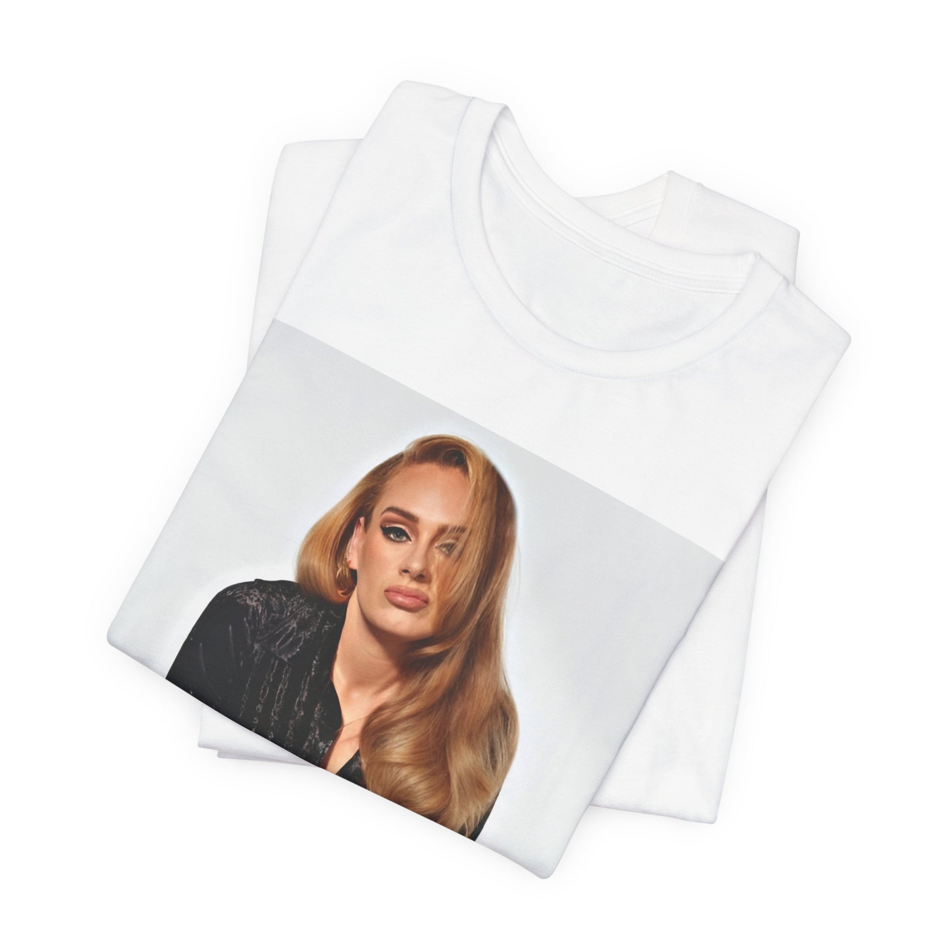 A black graphic t-shirt featuring a portrait of Adele from her iconic blonde era, with her hair styled and her expression poised and elegant.