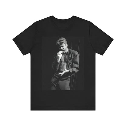 A black graphic t-shirt featuring a glamorous photo or graphic of George Michael performing live.