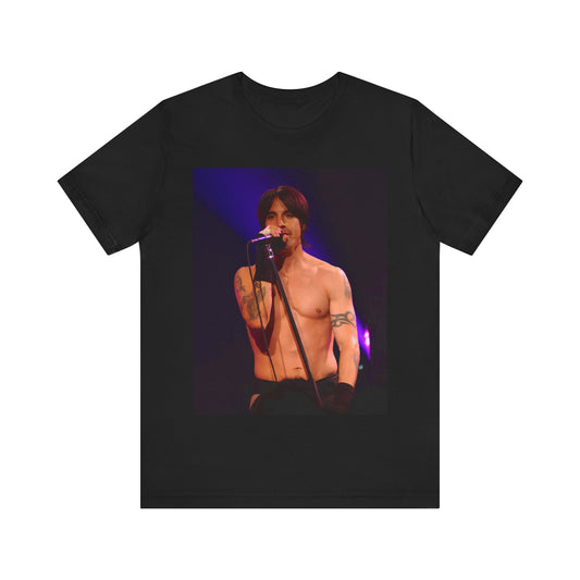 A black graphic t-shirt featuring a graphic of Anthony Kiedis from Red Hot Chili Peppers on tour.