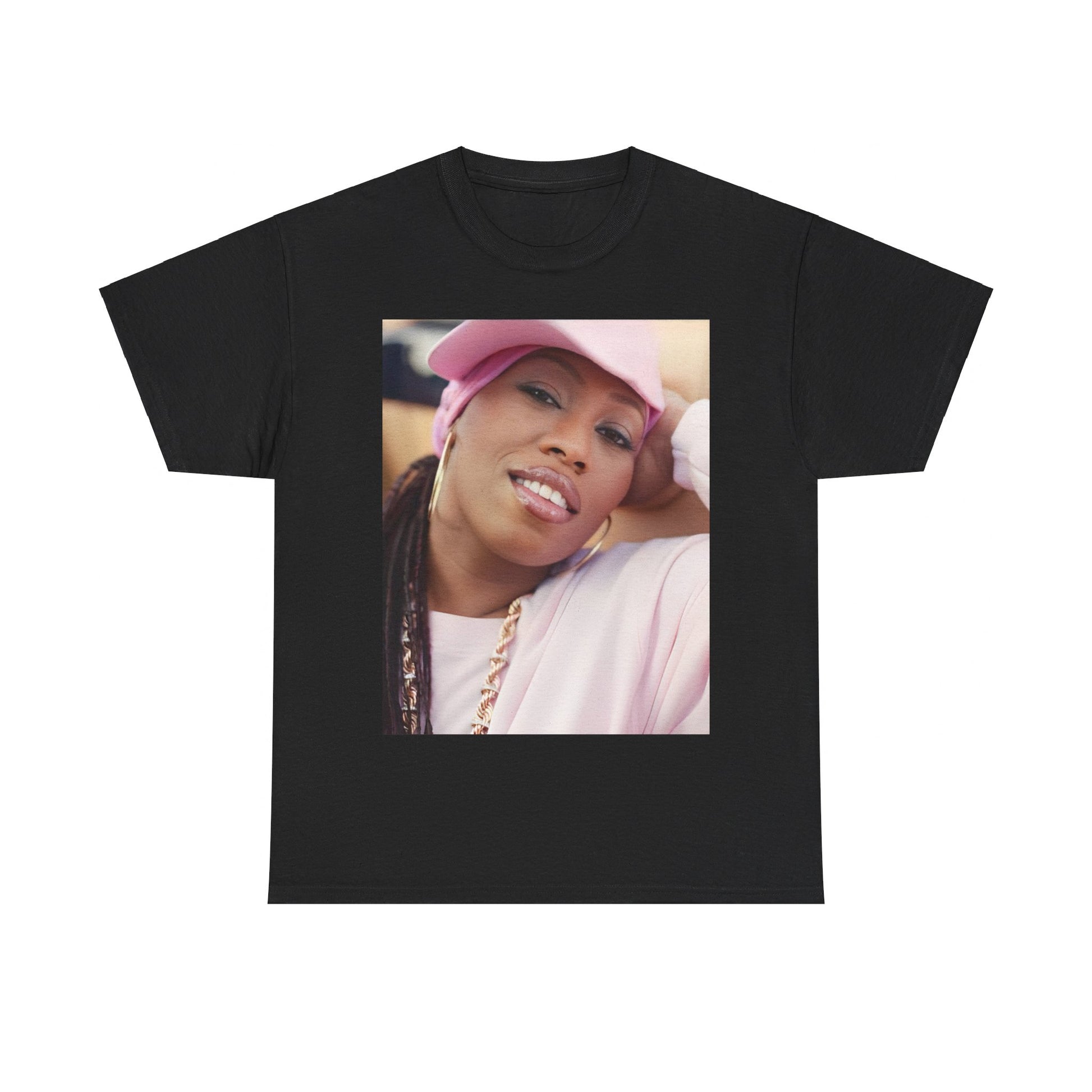 A black graphic t-shirt featuring a 90s rap graphic of Missy Elliott from her early days, emphasizing a raw style.