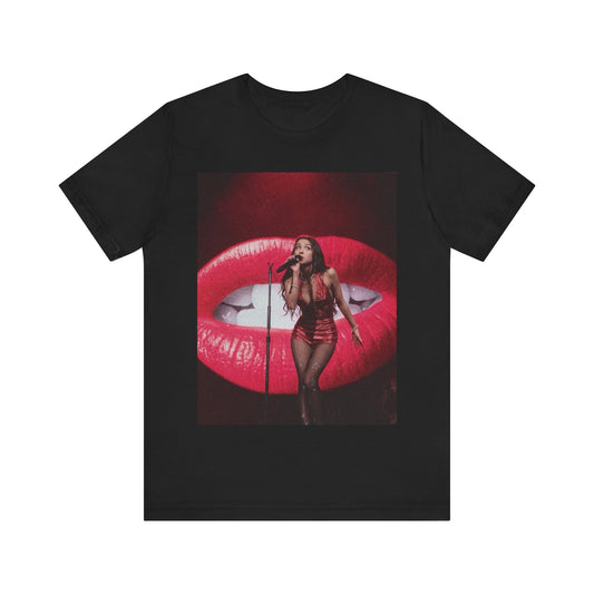 A black graphic t-shirt featuring a graphic or photo of Olivia Rodrigo performing live.