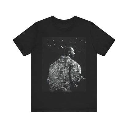 A black graphic t-shirt featuring a black and white graphic or photo of Drake performing live on stage.
