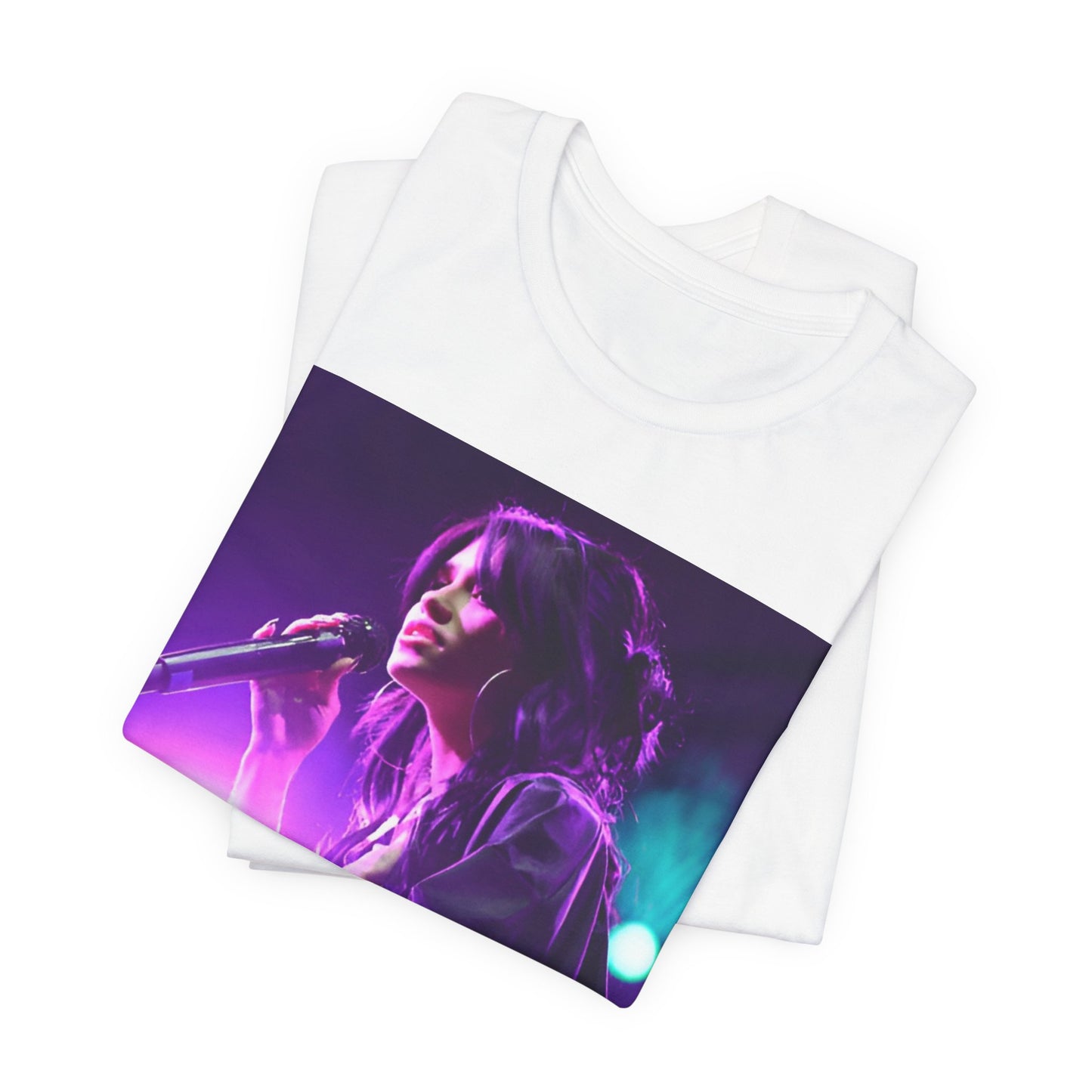 A black graphic t-shirt featuring a graphic or photo of Nessa Barrett performing live on stage.