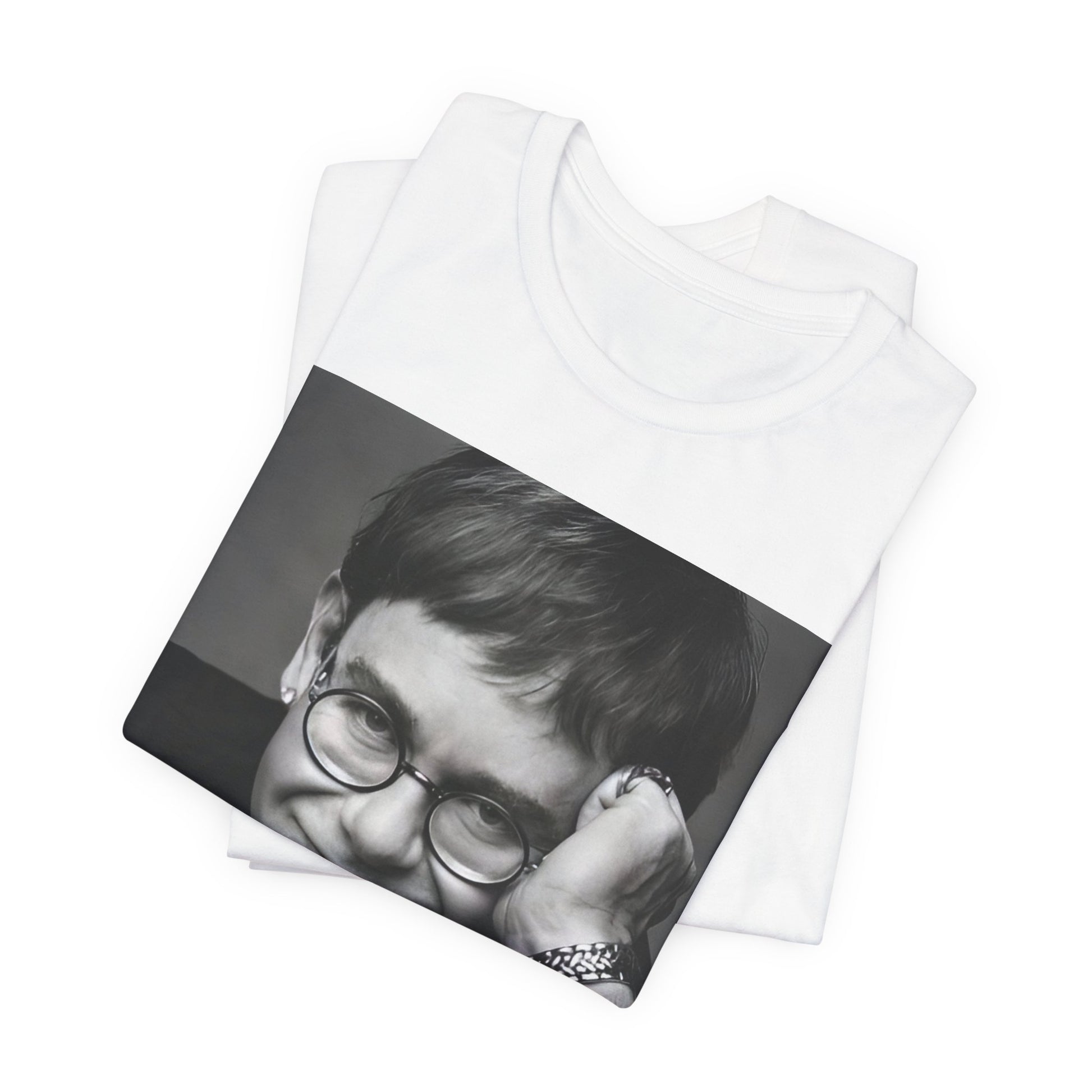 A black graphic t-shirt featuring a retro black and white photo portrait of Elton John.