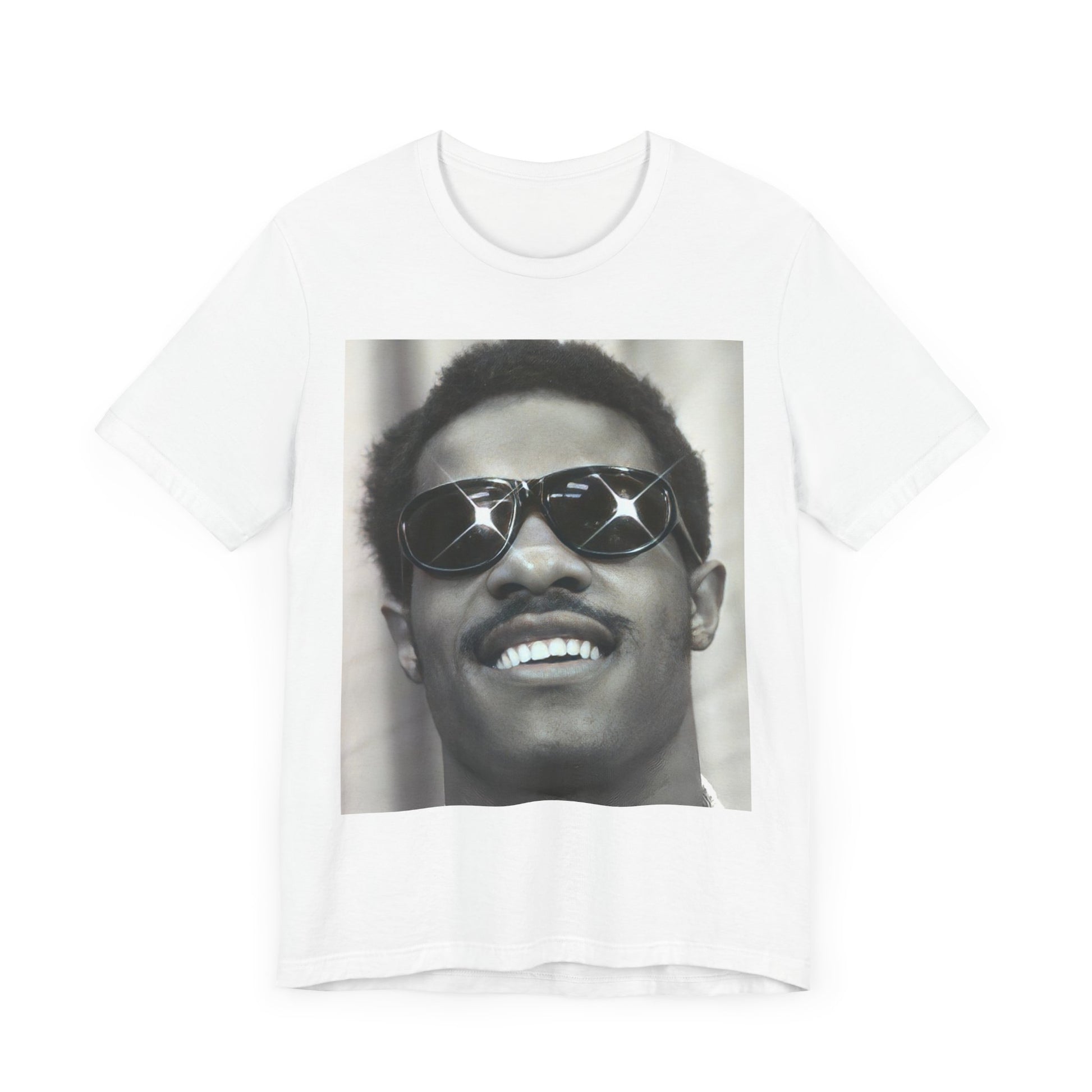 A black graphic t-shirt featuring a 70s funk aesthetic black and white graphic or photo of Stevie Wonder.