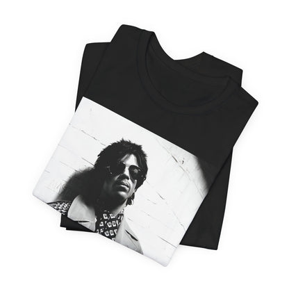 A black graphic t-shirt featuring Prince's iconic symbol, representing 'The Artist Formerly Known As'.