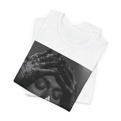 A black graphic t-shirt featuring a black and white graphic or photo of Sam Smith performing live on stage.