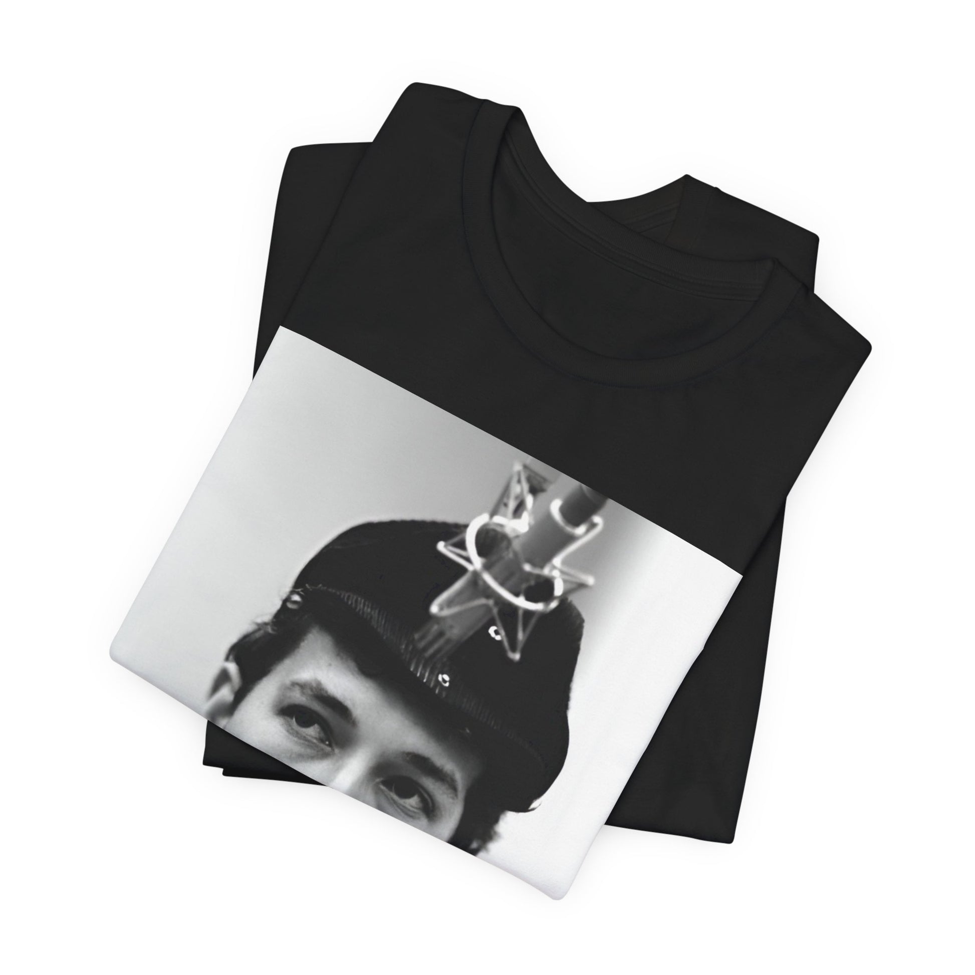 A black graphic t-shirt featuring a graphic of Bob Dylan in an acoustic session setting, possibly with his guitar.