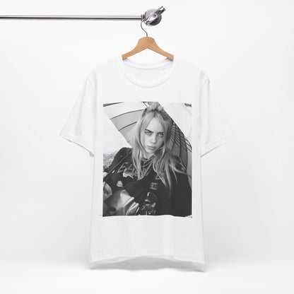 A graphic t-shirt inspired by the colorful and iconic music video for "Bad Guy" by Billie Eilish.