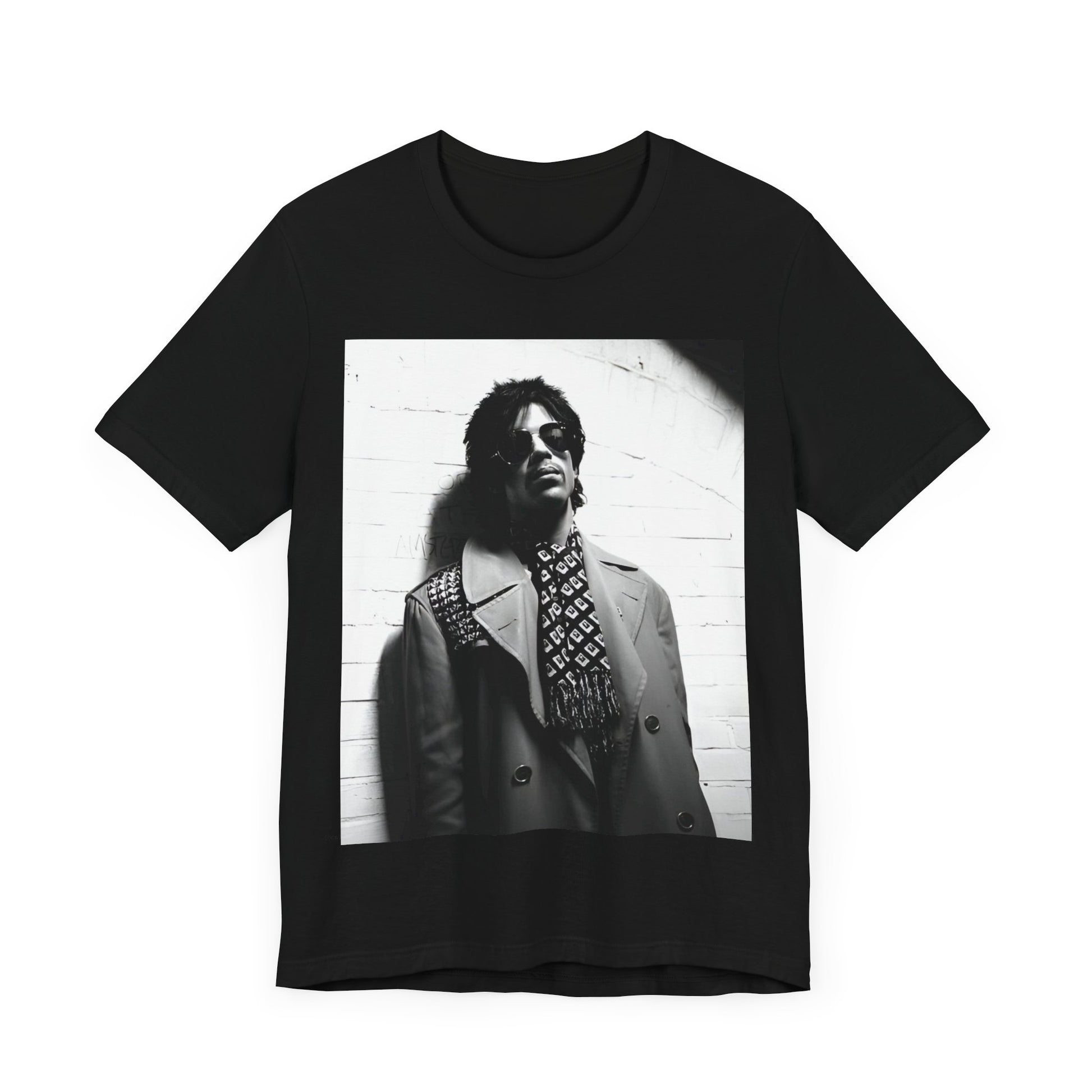 A black graphic t-shirt featuring Prince's iconic symbol, representing 'The Artist Formerly Known As'.