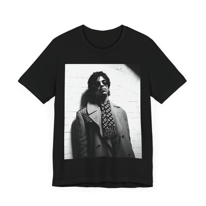 A black graphic t-shirt featuring Prince's iconic symbol, representing 'The Artist Formerly Known As'.