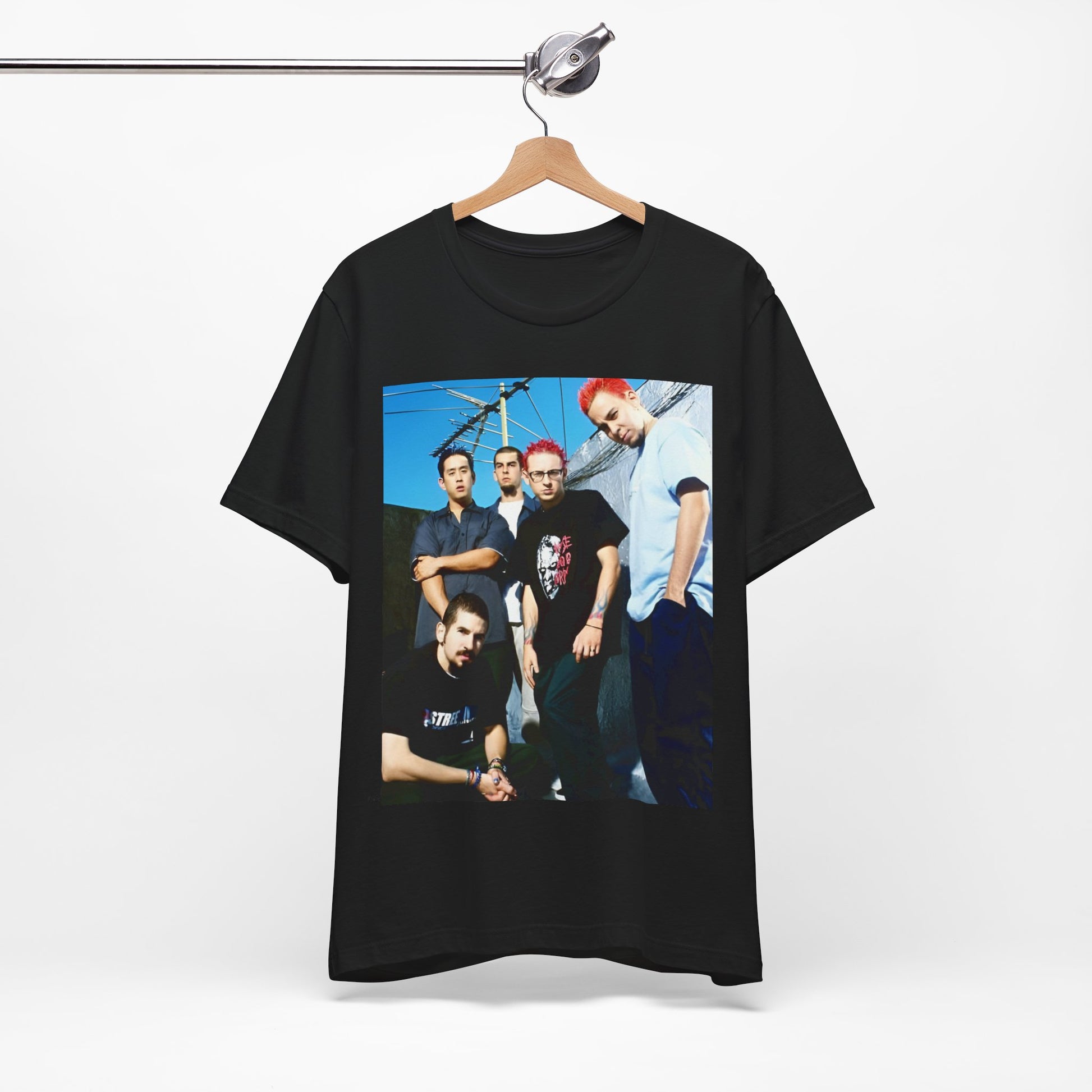 A black graphic t-shirt featuring a graphic of Linkin Park as a global nu rock phenomenon.
