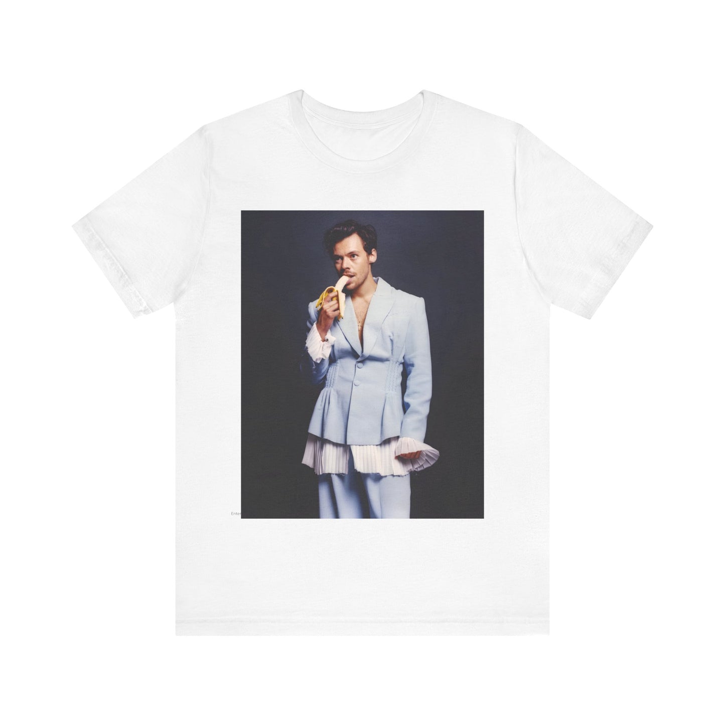 A black graphic t-shirt featuring a graphic related to Harry Styles and his One Direction legacy.