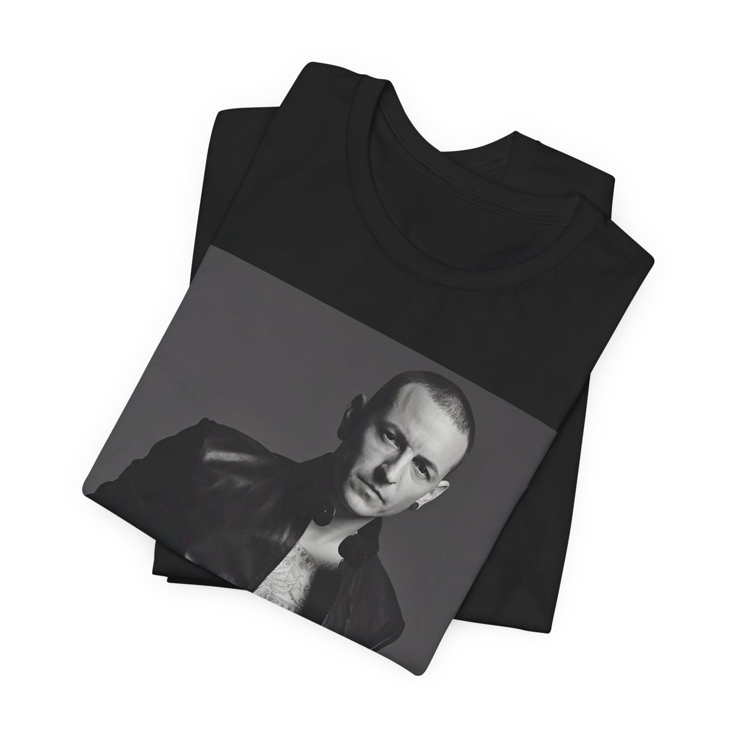 A black graphic t-shirt featuring a graphic of Chester Bennington from Linkin Park as a rock icon.
