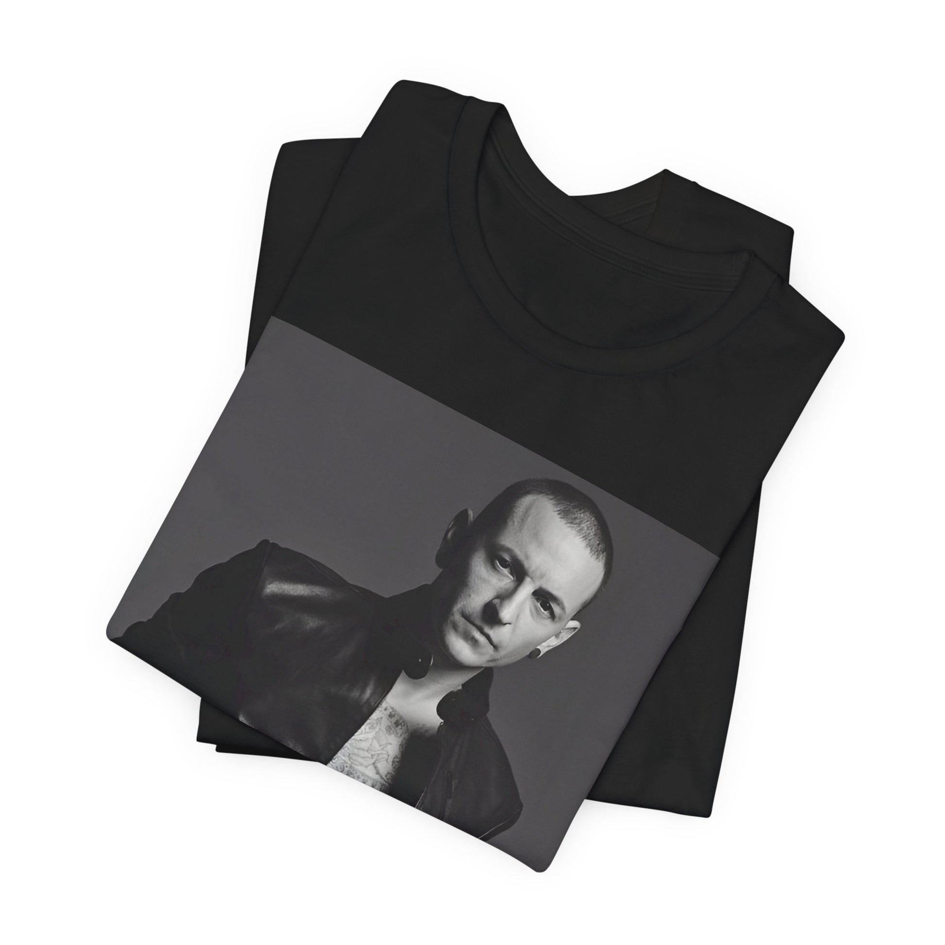 A black graphic t-shirt featuring a graphic of Chester Bennington from Linkin Park as a rock icon.