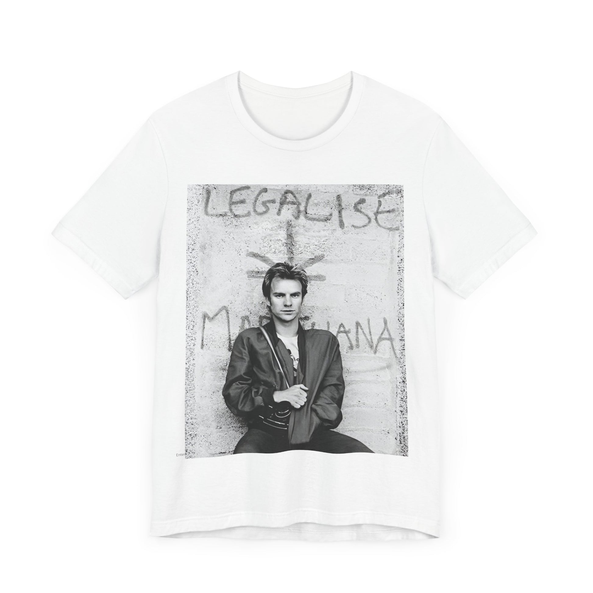 A black graphic t-shirt featuring a graphic of The Police with reggae-influenced pop elements.