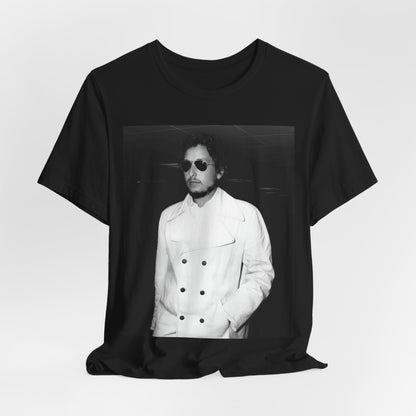 A black graphic t-shirt featuring a vintage black and white photo of Bob Dylan in a contemplative or iconic pose.