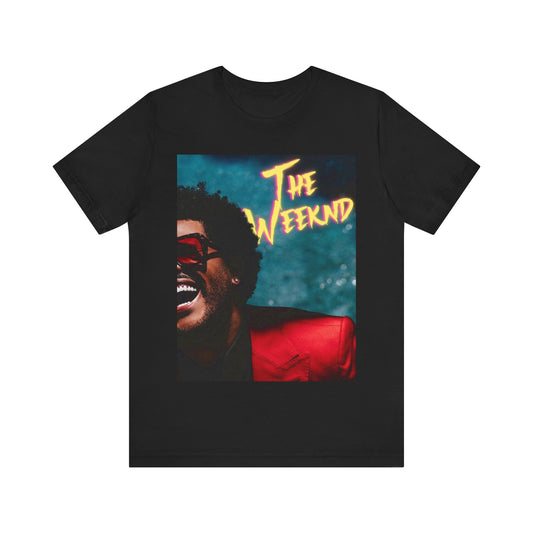 A black graphic t-shirt featuring a graphic of The Weeknd in his iconic red suit.