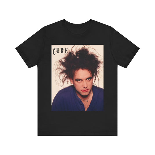 A black graphic t-shirt featuring a photo portrait of Robert Smith from The Cure.